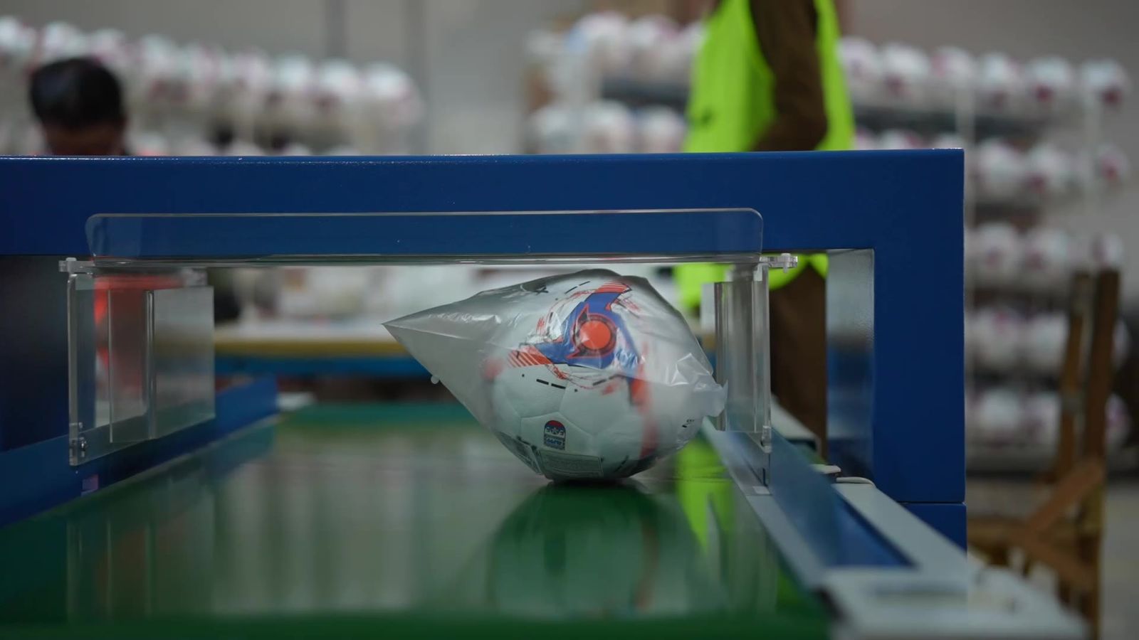 Packed ball passing an inspection unit